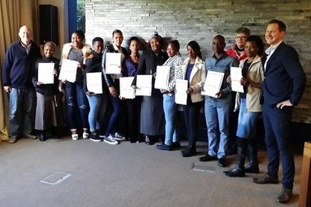 From ltr are Michael Lutzeyer, the students, Viola Syotywa, Susan Lochner and Craig Versfeld